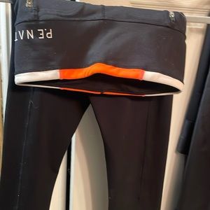 P.E nation black legging orange white around waist. No tag medium